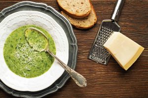 A bowl of asparagus soup isn't complete without parmesan.